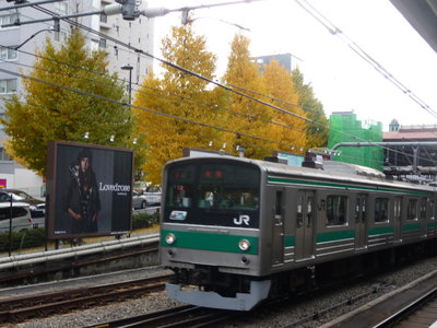 Saikyo Line train passing Harajuku Station